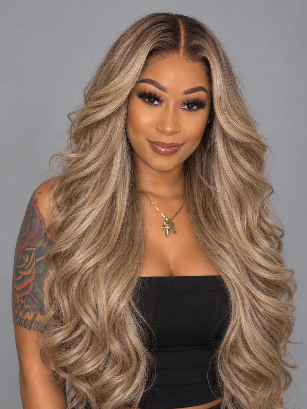 613 Blonde Bombshell Body Wave Bundles — styled on model